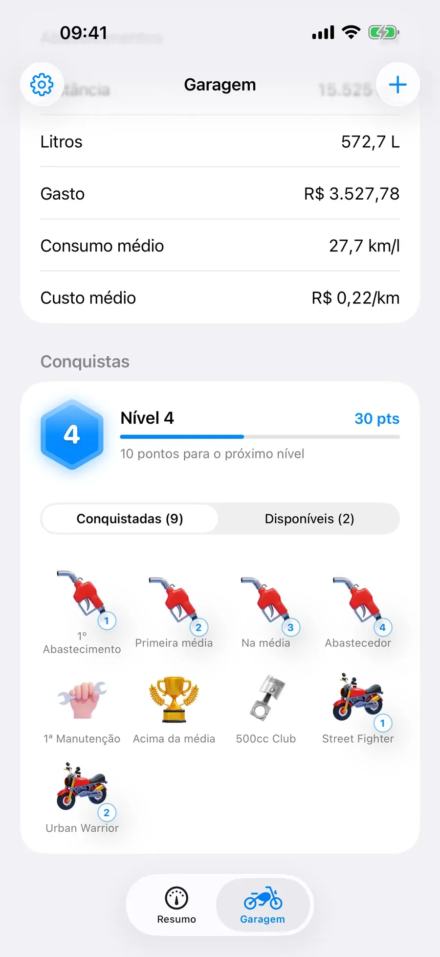 The Achievements section of the Garage screen: a hexagon showing level 4 with 30 points, a progress bar, an Earned and Available tab control, and a grid of 3D medals